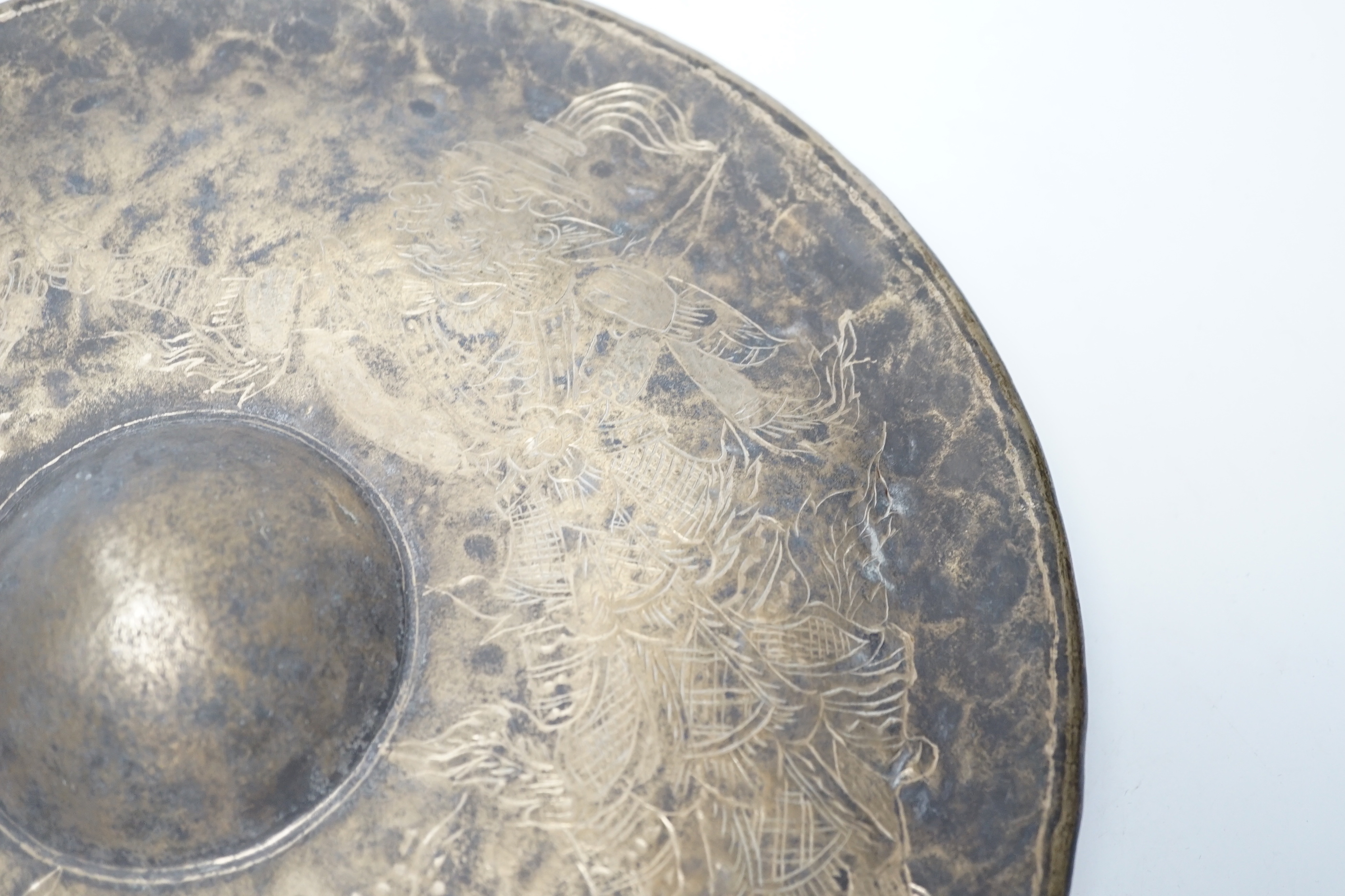 An Indonesian silver plated gong and beater, gong 33cm diameter